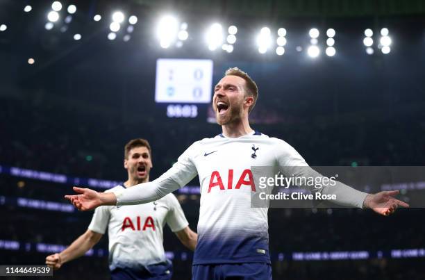 Christian Eriksen of Tottenham Hotspur celebrates after scoring his team's first goal during the Premier League match between Tottenham Hotspur and...