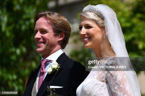 Newlyweds Thomas Kingston and Lady Gabriella Windsor leave after their wedding ceremony at St George's Chapel in Windsor Castle, Windsor, west of...