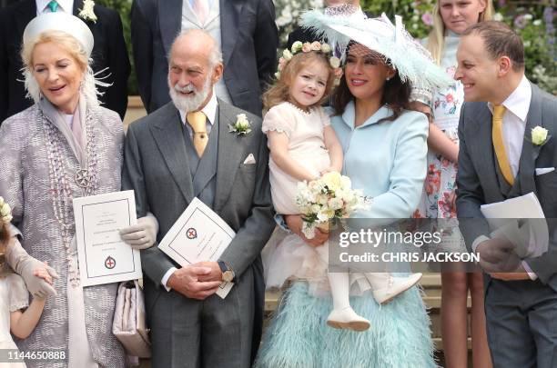 Britain's Princess Michael of Kent and Britain's Prince Michael of Kent stan with Britain's Lady Frederick Windsor and Lord Frederick Windsor as they...