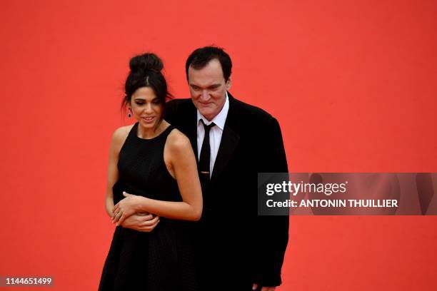 Film director Quentin Tarantino and his wife Israeli singer Daniella Pick pose as they arrive for the screening of the film "The Wild Goose Lake " at...