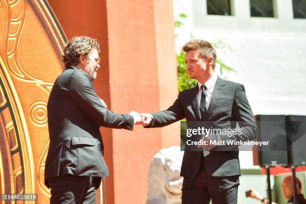 Mark Ruffalo and Jeremy Renner pose at the Marvel Studios' 'Avengers: Endgame' Cast Place Their Hand Prints In Cement At TCL Chinese Theatre IMAX...