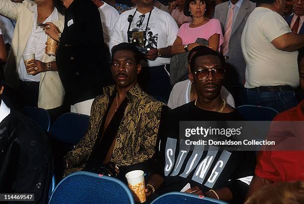 Comedian Eddie Murphy Charlie Murphy pose for a portrait in April 6, 1987 in Los Angeles, California.