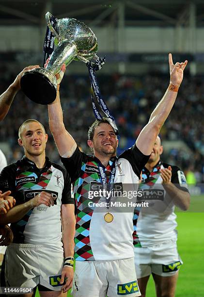 Nick Evans of Harlequins celebrates with the trophy at the end of the Amlin Challenge Cup Final match between Harlequins and Stade Francais at the...
