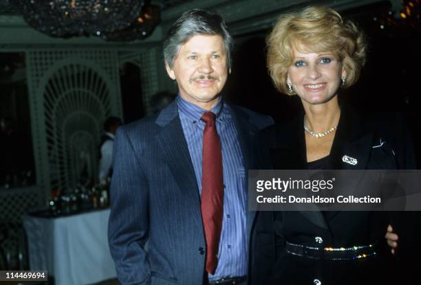 Actor Charles Bronson Actress Jill Ireland pose for a portrait in circa 1985 in Los Angeles, California.