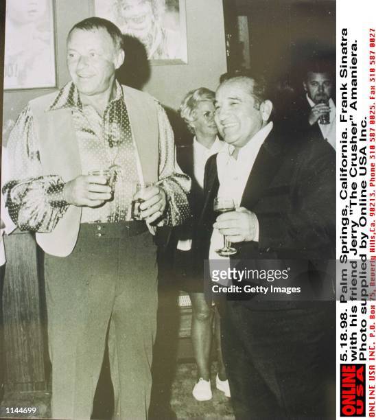 Palm Springs, California. Frank Sinatra with friend Jerry "The Crusher" Amaniera, who has been told by Barbara Sinatra to stay away from Frank's...