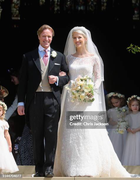 Newlyweds Mr Thomas Kingston and Lady Gabriella Windsor share a kiss on the steps of the chapel after their wedding at St George's Chapel on May 18,...