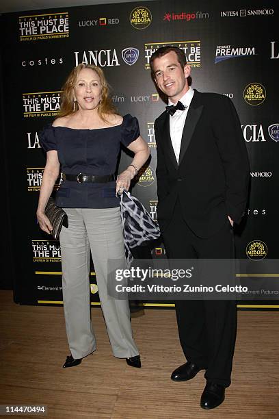 Faye Dunaway and Liam O'Neill attends the 'This Must Be The Place' party hosted by Lancia during the 64th Cannes Film Festival at Plage La Mandala on...