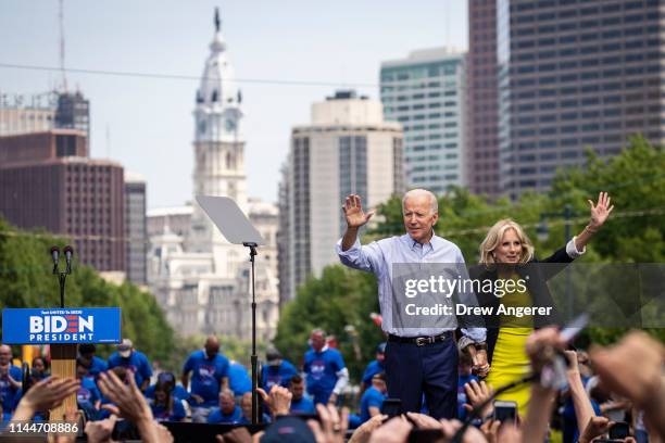 Democratic presidential candidate former U.S. Vice President Joe Biden and wife Dr. Jill Biden wave to the crowd at the end of a campaign kickoff...