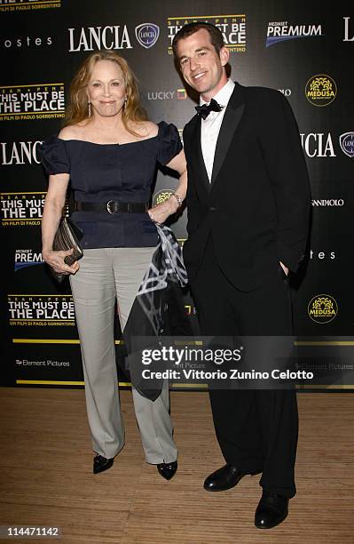 Faye Dunaway and Liam O'Neill attend the 'This Must Be The Place' party hosted by Lancia during the 64th Cannes Film Festival at Plage La Mandala on...