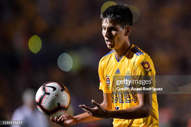 Jürgen Damm, #25 of Tigres, handles the ball during the final first leg match between Tigres UANL and Monterrey as part of the CONCACAF Champions...
