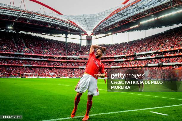 Benfica's Swiss forward Haris Seferovic celebrates after scoring during the Portuguese League football match between Benfica and Santa Clara at the...