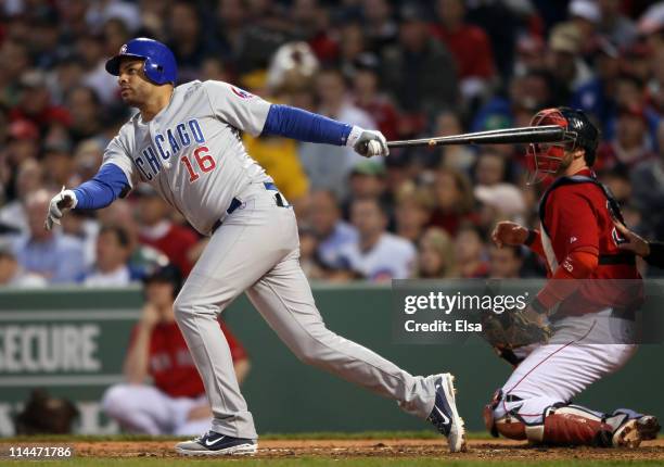 Aramis Ramirez of the Chicago Cubs hits an RBI as Jarrod Saltalamacchia of the Boston Red Sox catches on May 20, 2011 at Fenway Park in Boston,...