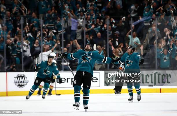 Logan Couture of the San Jose Sharks celebrates after he scored the tying goal in the third period of their game against the Vegas Golden Knights in...