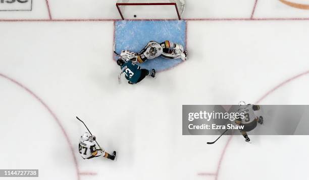 Barclay Goodrow of the San Jose Sharks scores the game-winning goal against Marc-Andre Fleury of the Vegas Golden Knights in overtime in Game Seven...