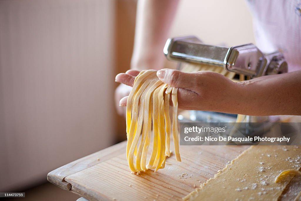 Woman making some noodles