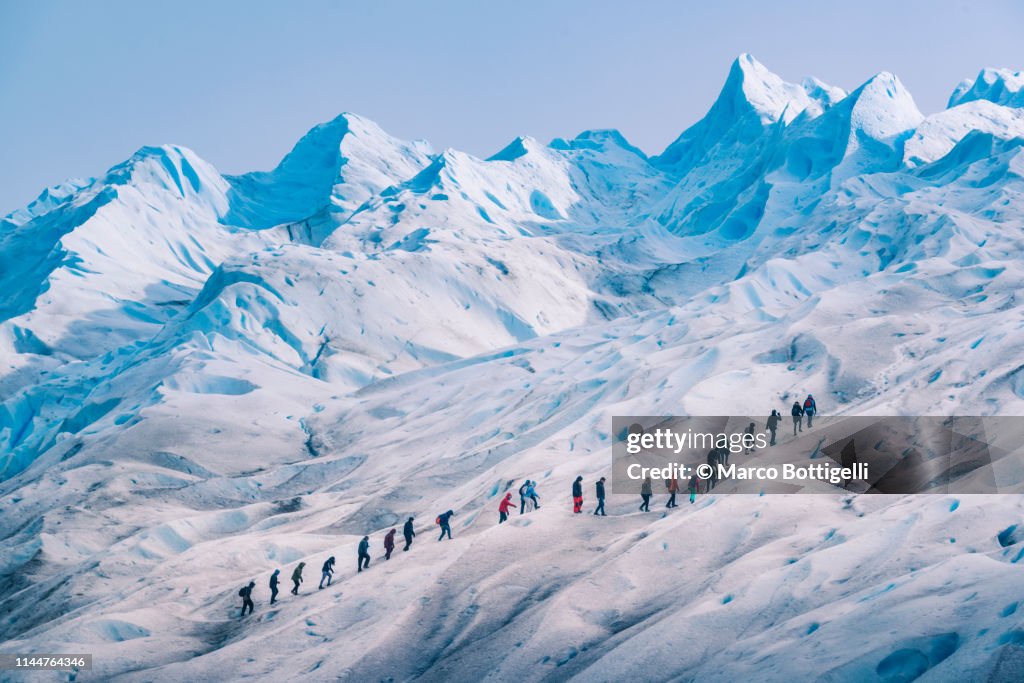 People hiking on the Perito Moreno glacier, Argentina