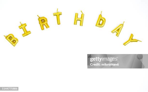 happy birthday candles in golden colors - letter r stock-fotos und bilder