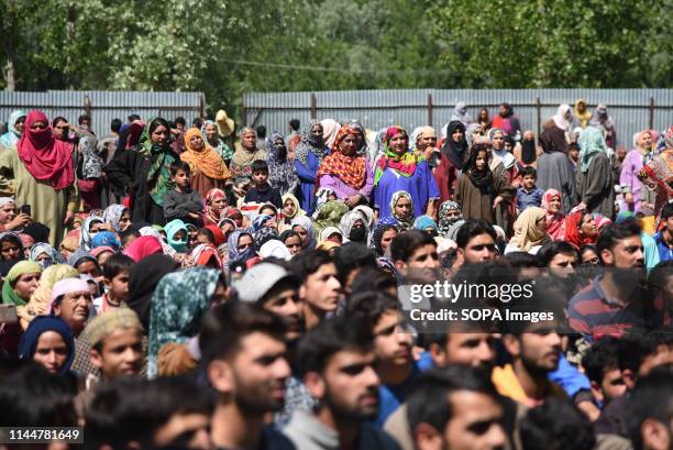 Kashmiri villagers are seen gathered during the funeral procession of Kashmiri Rebel Showkat Ahmed at his residence in Pulwama, South of Srinagar....