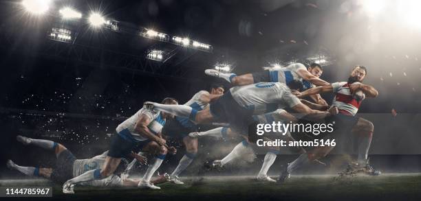 men are playing rugby at stadium - rugby imagens e fotografias de stock