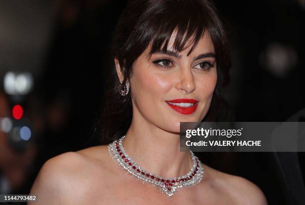 Romanian actress Catrinel Marlon arrives for the screening of the film "The Whistlers " at the 72nd edition of the Cannes Film Festival in Cannes,...