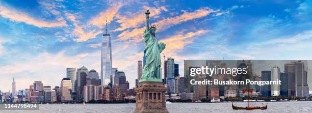 statue of liberty with nyc usa - statue of liberty stock pictures, royalty-free photos & images
