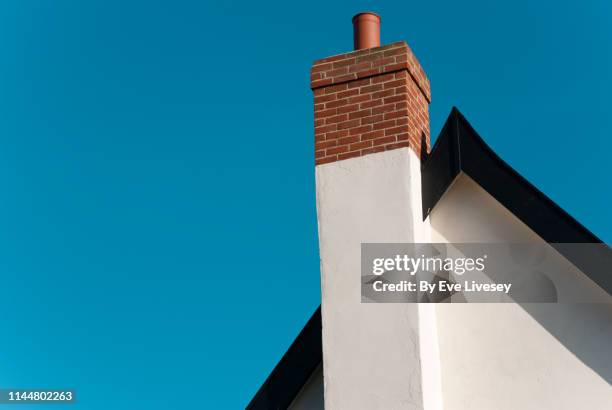 house roof & chimney - simple house exterior foto e immagini stock