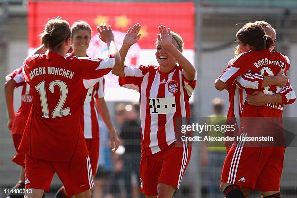 Julia Simic of Muenchen celebrates victory with her team mates after winning the women Bundesliga Cup 2011 final match between FC Bayern Muenchen and...