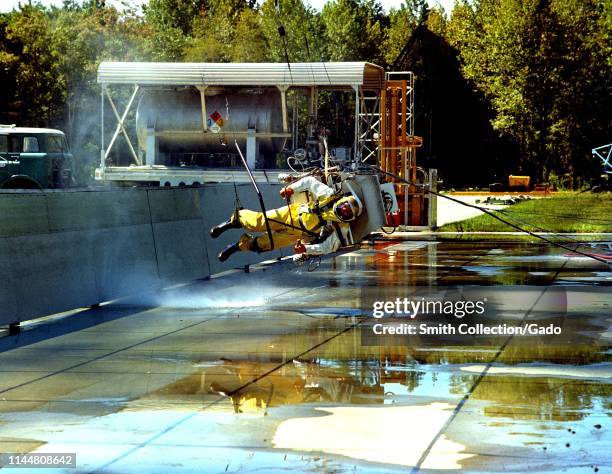 Langley researcher 'moon walks' under the Lunar Landing Research Facility's gantry at NASA's Langley Research Center in Hampton, Virginia, August,...