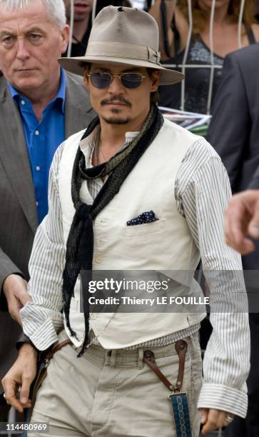 Actor Johnny Depp arrives before the 'Pirates of the Caribbean: On Stranger Tides' photocall at the Palais des Festivals during the 64th Cannes Film...
