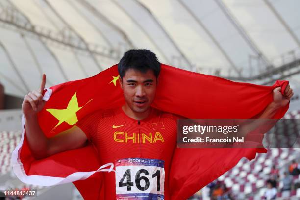 Xie Wenjun of China celebrates after winning the 110m Hurdles Men race during Day Four of the 23rd Asian Athletics Championships at Khalifa...