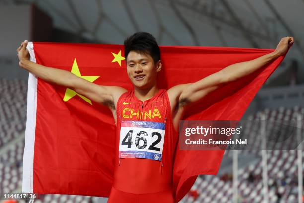 Xie Zhenye of China celebrates after winning the 200m Men final race during Day Four of the 23rd Asian Athletics Championships at Khalifa...