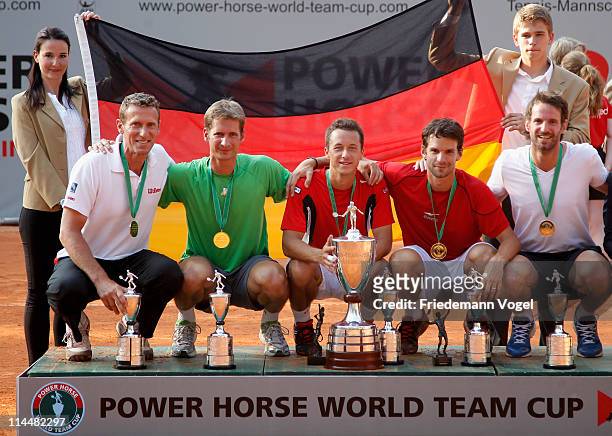 Coach Patrik Kuehnen, Florian Mayer, Philipp Kohlschreiber, Philipp Petzschner and Christopher Kas celebrate after winning the Power Horse World Team...