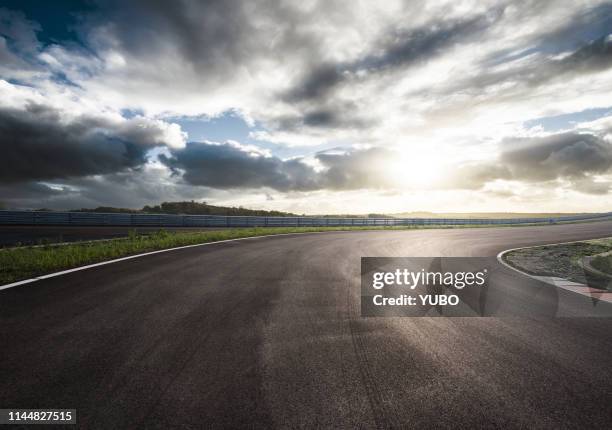 motor racing track - racing track stock pictures, royalty-free photos & images