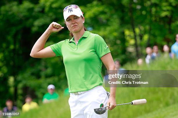 Sophie Gustafson of Sweden reacts to her birdie on the 18th green to defeat Michelle Wie in round three of the Sybase Match Play Championship at...