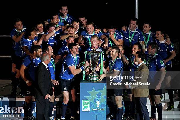 The Leinster players prepare to lift the trophy following their victory at the end of the Heineken Cup Final match between Leinster and Northampton...