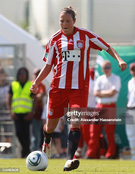 Isabell Bachor of Muenchen runs with the ball during the women Bundesliga Cup 2011 final match between FC Bayern Muenchen and 1.FFC Turbine Potsdam...