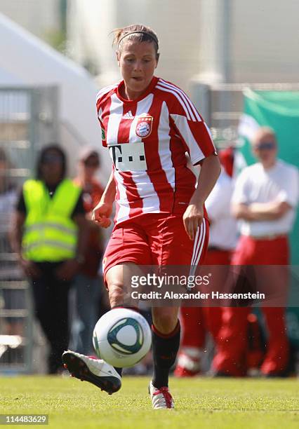 Isabell Bachor of Muenchen runs with the ball during the women Bundesliga Cup 2011 final match between FC Bayern Muenchen and 1.FFC Turbine Potsdam...
