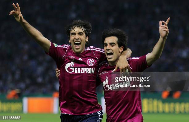 Jose Manuel Jurado of Schalke celebrates with team mate Raul Gonzalez after scoring his teams fourth goal during the DFB Cup final match between MSV...