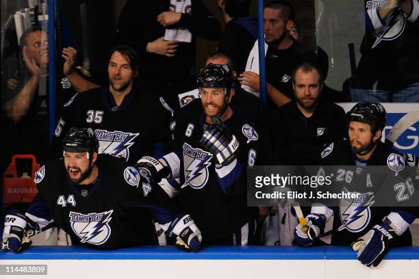 Nate Thompson, Ryan Malone and Martin St. Louis of the Tampa Bay Lightning celebrate a second period goal against the Boston Bruins in Game Four of...