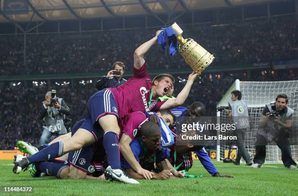 Klaas Jan Huntelaar of Schalke celebrates after winning the DFB Cup final match between MSV Duisburg and FC Schalke 04 at Olympic Stadium on May 21,...