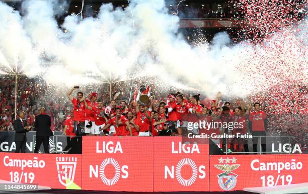 Benfica players celebrate with trophy after winning at the end of the Liga NOS Championship the Liga NOS match between SL Benfica and CD Santa Clara...