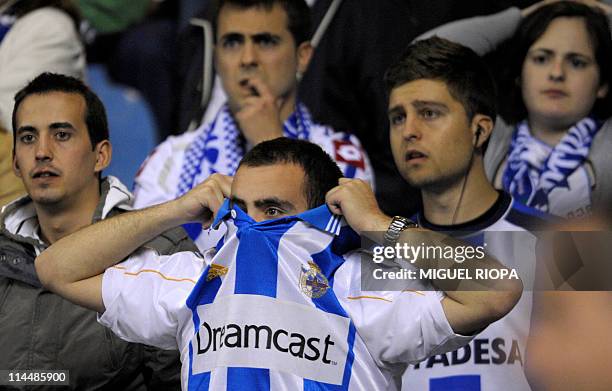 Deportivo de la Coruna's supporters react during the Spanish league football match RC Deportivo de La Coruna vs Valencia on May 21, 2011 at Municipal...