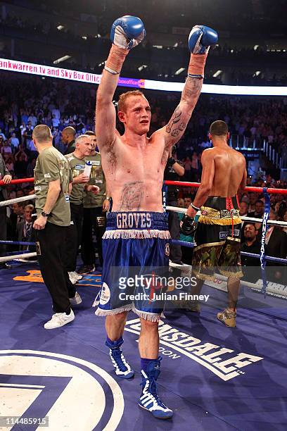 George Groves of England celebrates defeating James DeGale of England in the British and Commonwealth Super-Middleweight Championship during World...