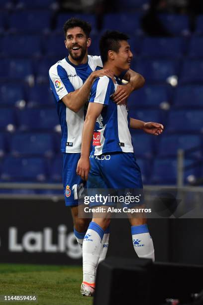 Wu Lei of RCD Espanyol celebrates with team mate Didac Villa after scoring the La Liga match between RCD Espanyol and RC Celta de Vigo at RCDE...