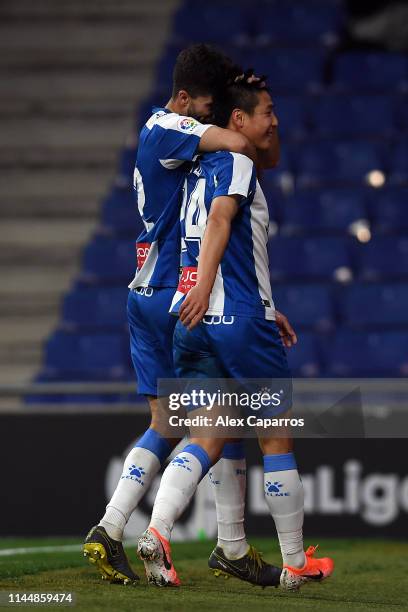 Wu Lei of RCD Espanyol celebrates with team mate Didac Villa after scoring the La Liga match between RCD Espanyol and RC Celta de Vigo at RCDE...