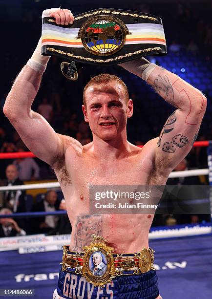 George Groves of England celebrates defeating James DeGale of England in the British and Commonwealth Super-Middleweight Championship during World...