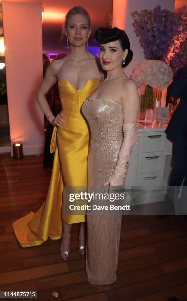 Desiree Gallas and Dita Von Teese attend the Vanity Fair and Chopard Party celebrating the 72nd Annual Cannes Film Festival at Hotel du Cap-Eden-Roc...