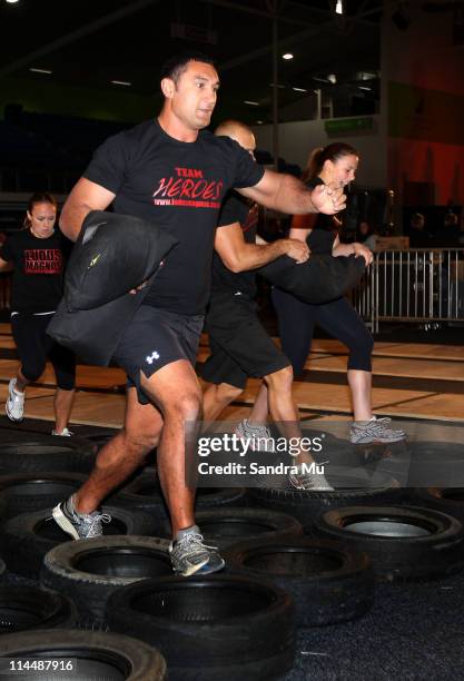 Andrew Blowers, former rugby player races in the celebrity obstacle challenge during the Rise Up Christchurch telethon appeal event at Trusts Stadium...