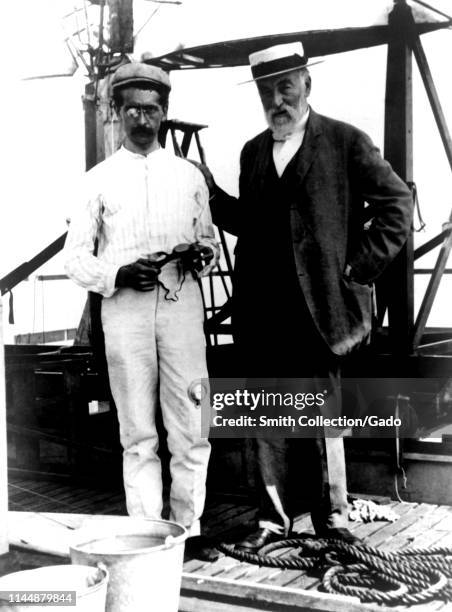 Portrait of Samuel Pierpont Langley , right, and chief mechanic Charles M Manly as they pose at the Langley Research Center in Hampton, Virginia,...