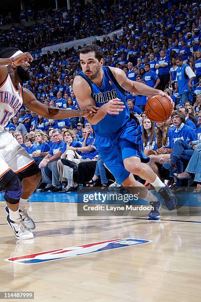 Peja Stojakovic of the Dallas Mavericks drives against James Harden of the Oklahoma City Thunder during Game Three of the Western Conference Finals...